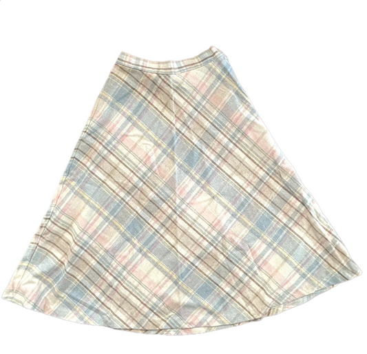 Vintage white, blue, brown, pink and yellow medium length ladies skirt on white background.